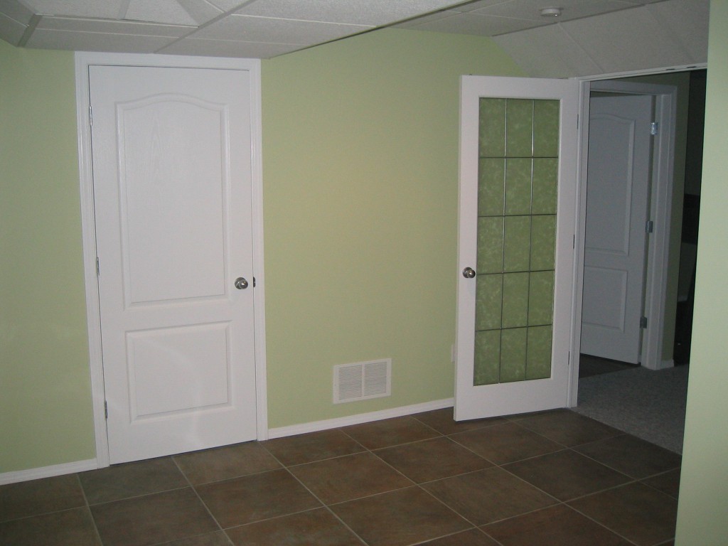 renovated basement with green walls