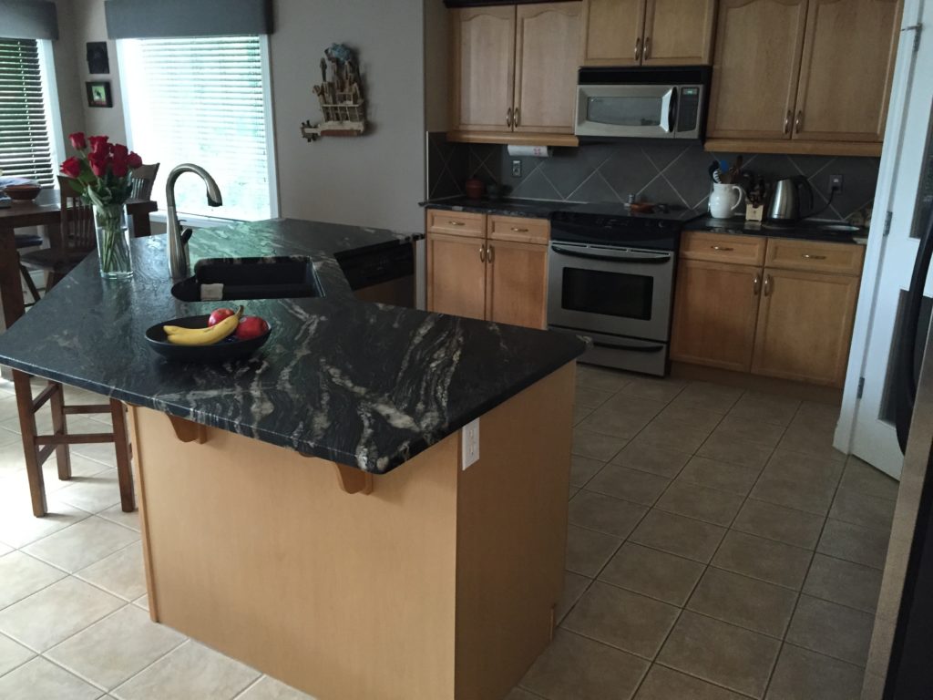 kitchen with black counter top