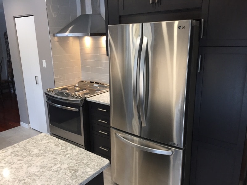 renovated kitchen with new fridge